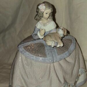 Retired Lladro Pilar Girl with Pup, possibly missing a petal from bouquet